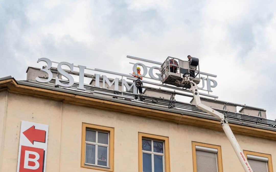 Advertising sign installation above the rooftops of Vienna